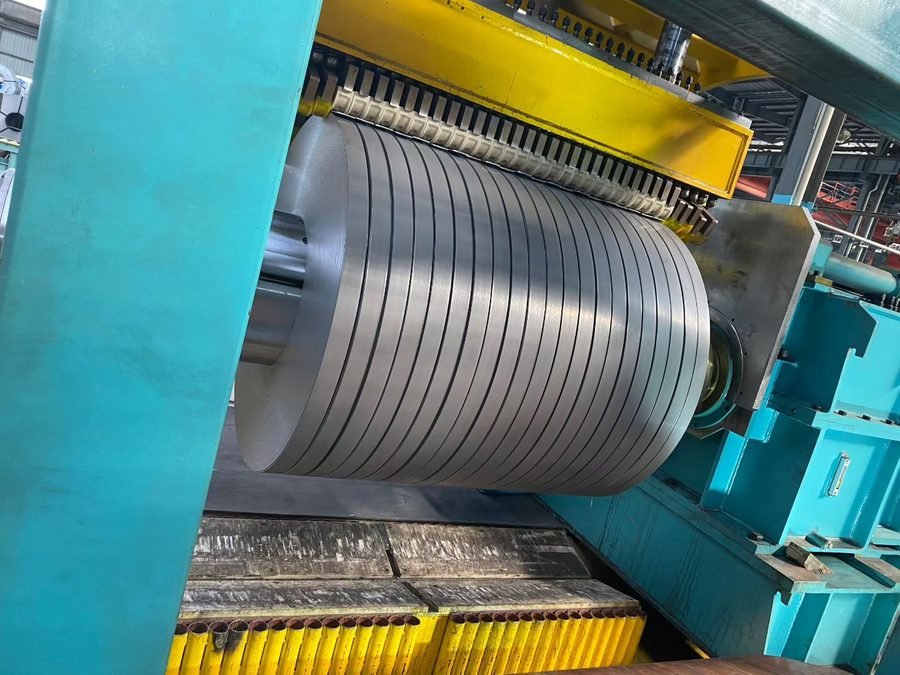 Precision slitting and flattening line